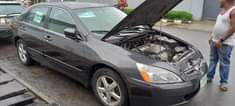 A picture of Honda Eod 2004 Grey color bur and drive chilling ac