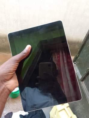 A picture of Microsoft surface pro with slight invisible crack has 4gbram 64gb