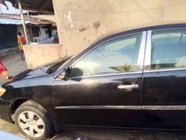 A picture of SMARTAUTOS DEALER BUY ENGINE 80 GEAR IS GOOD AC NEEDS