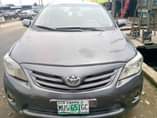 A picture of Money urgently needed for this 2010 Toyota Corolla painted on