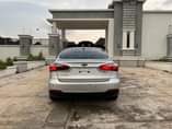 A picture of NEATLY USED 2014 KIA CEREATO WITH DUTY AND COMPLETE PAPERS