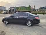 A picture of NEATLY USED 2009 V6 WITH ALL CATALYST INTACT