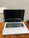 A picture of MAC BOOK PRO CORE I7