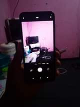 A picture of Redime 1 plus ram3 gb32 andred12 imenyooka chaji mkataba camera