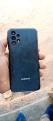 A picture of Galaxy A13 on sale I month used with its box