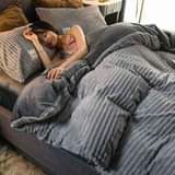 A picture of 4 PIECES VOLVET BEDCOVERS