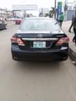 A picture of 6 months used 2011 Toyota corolla Neatly used with everything