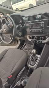 A picture of Sharp 2014 Kia Rio sound engine gear and ac partly