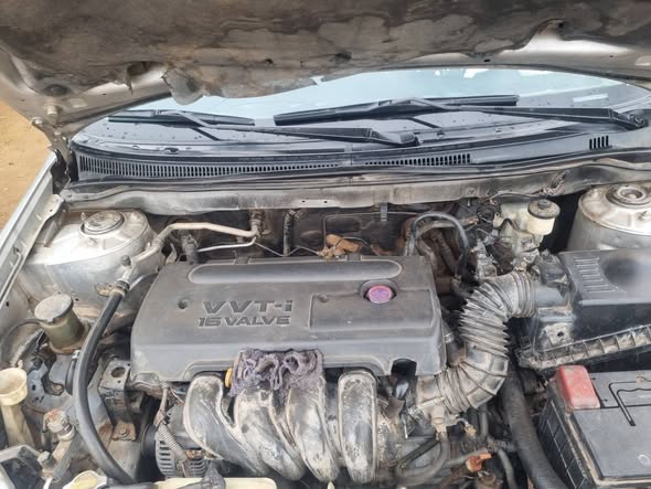 A picture of Distress Distress Distress a very clean Toyota corolla with untampered