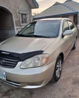 A picture of Toks standard corolla 2004 Gear engine and ac working perfectly