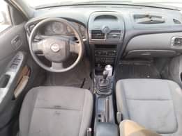 A picture of NISSAN SUNNY 2008 MODEL 4 CYLINDER ENGINE body is clean
