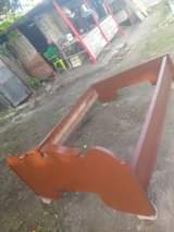 A picture of TV na kitanda