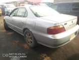 A picture of Acura TL with very clean body