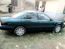 A picture of Super clean Toyota Camry tiny light everything working perfectly AC