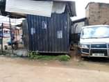 A picture of 20ft container with two stores shop spaces sold with all