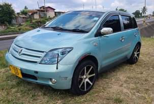 A picture of ToyOta Ist DXP Mwaka 2004 5 Cc 1290 Haijarudiwa Rangi