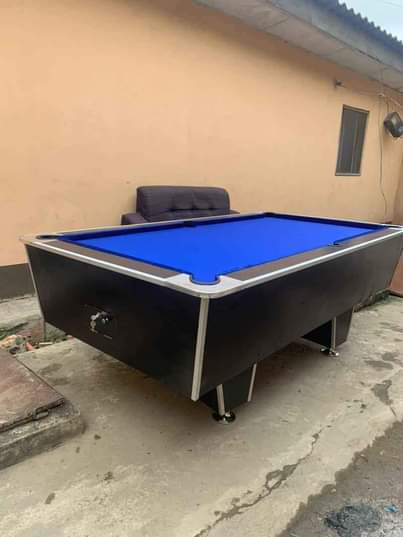 A picture of Snooker board with full accessories