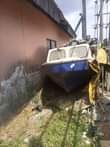 A picture of This fibre boat with the double engine 27 horsepower for