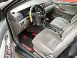 A picture of Toyota Corolla 04 model Sound Engine and Gear AC chilling