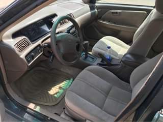 A picture of Neatly Used Toyota Camry envelope UNTEMPERED ENGINE AND GEAR clean