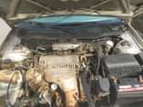 A picture of Very sharp silver color 2002 Toyota Camry droplite Engine gear