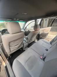 A picture of DIRECT TOKUMBO TOYOTA HIGHLANDER YEAR 2006 SWEET CREAM INTERIOR CUSTOM
