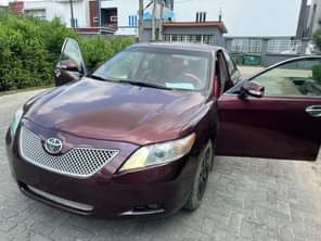 A picture of Toyota Camry 2010 model With an ANDROID SCREEN Neatly baked