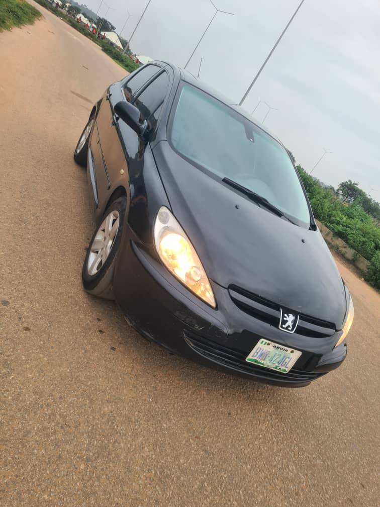 A picture of Naija used Peugeot 307 with sound and untempered engine 08138175643
