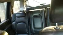 A picture of 2003 Nissan 2000 Nice