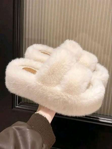 A picture of FLUFFY SLIDES ALL SIZE AVAILABLE CALL US ON 0788292299