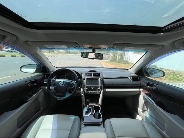 A picture of CLEAN PRE OWNED 2013 TOYOTA CAMRY XLE 10 300 000