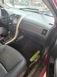 A picture of 2012 Corolla Everything is intact Very clean Ac is chilling