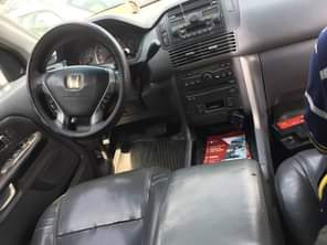 A picture of Very clean Honda pilot No waste time oooo As Edey