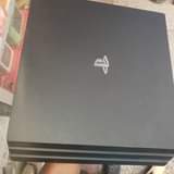 A picture of Playstation 4 Pro clean condition full package unapata kwa bei