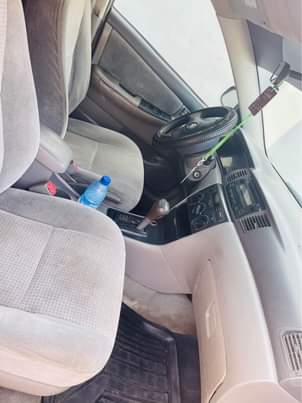 A picture of 2006 Corolla engine is 70 gear and AC is perfect