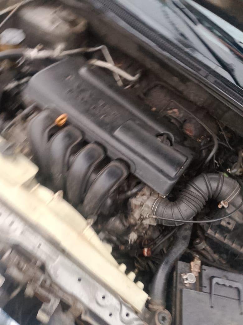 A picture of MAD Distress 2004 Toyota Corolla Buy and Drive