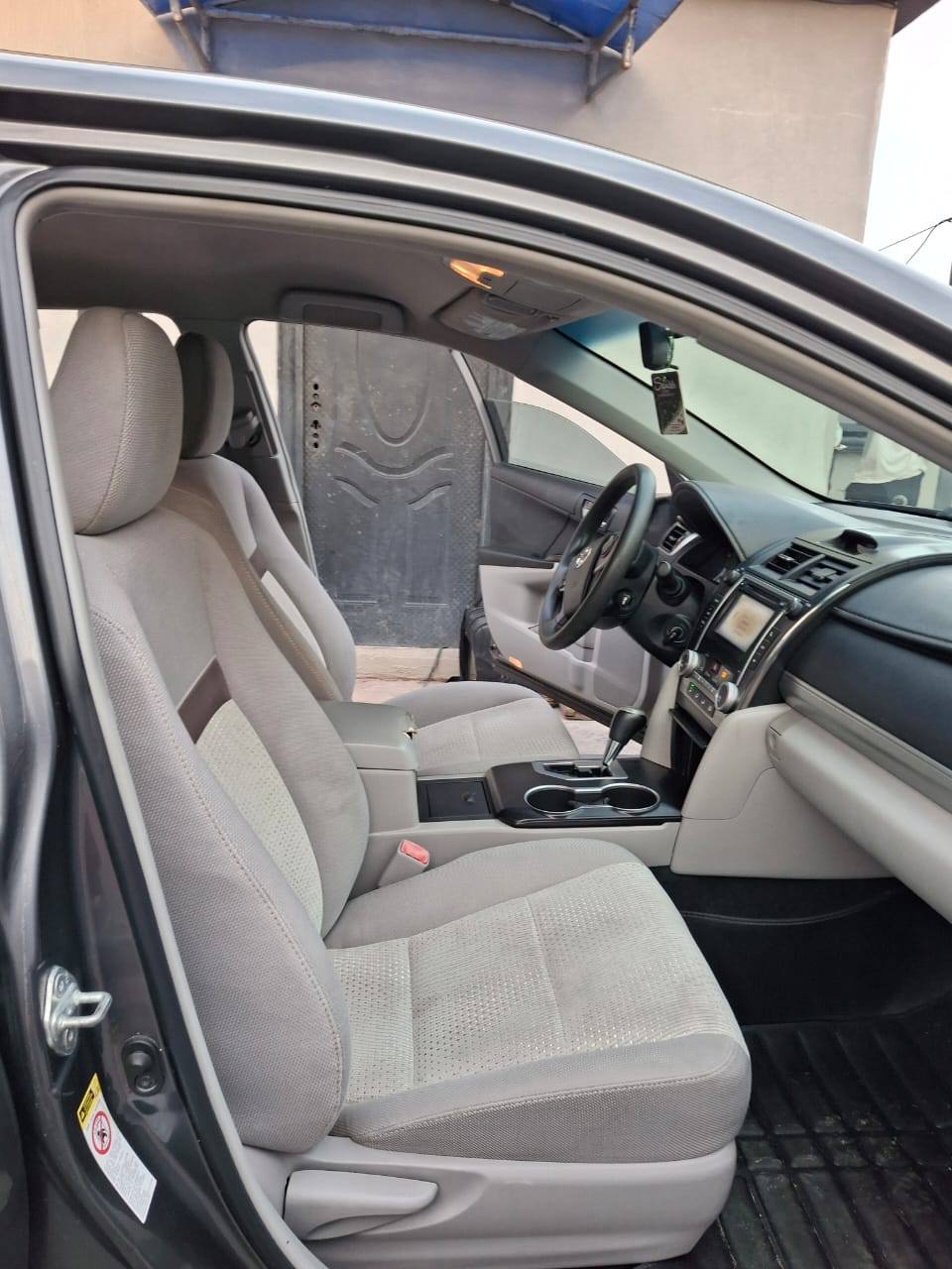 A picture of URGENT SALES 2 MONTHS REGISTERED 2013 Toyota Camry LE 4plugs