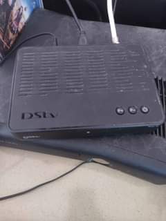 A picture of DSTV decoder Dish and Remote Controller