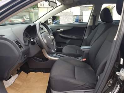 A picture of 2009 model Toyota Corolla working perfectly buy and driving the