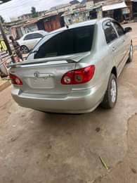 A picture of Corolla 04 everything working fine including AC Going for 3m