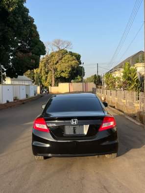 A picture of NEATLY USED 2013 HONDA CIVIC WITH COMPLETE ORIGINAL PAPERS AC
