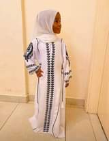 A picture of Kids Dubai zoom Material ABAYA