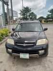 A picture of URGENT SALE Clean Reg 03 Acura MDX first body first