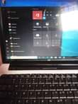 A picture of HP laptop with Original New battery and charger