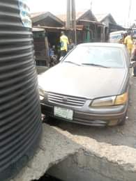 A picture of toyota tiny light Manual transmission Note Engine AC Need Gas
