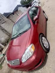 A picture of Toyota Corolla 2006 Color Red Properly Used Baked on First