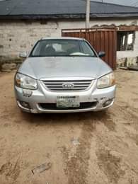 A picture of 2008 KIA CERATO SOUND ENGINE SHARP GEAR CHILLING AC COMPLETE