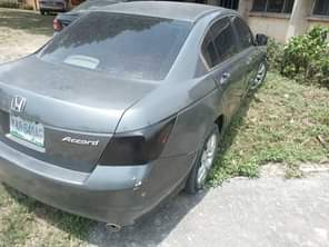 A picture of 2009 Honda Accord Engine has noise Gear and ac is
