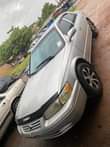 A picture of Toyota Camry pencil tokunbo standard not register pure first body