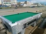 A picture of COIN SLOT MACHINES AND POOLTABLE